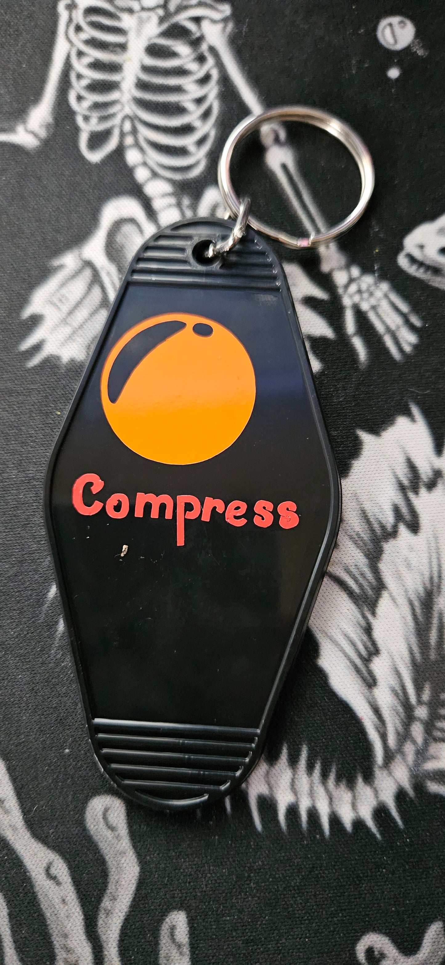 Mr. Compress Keychain